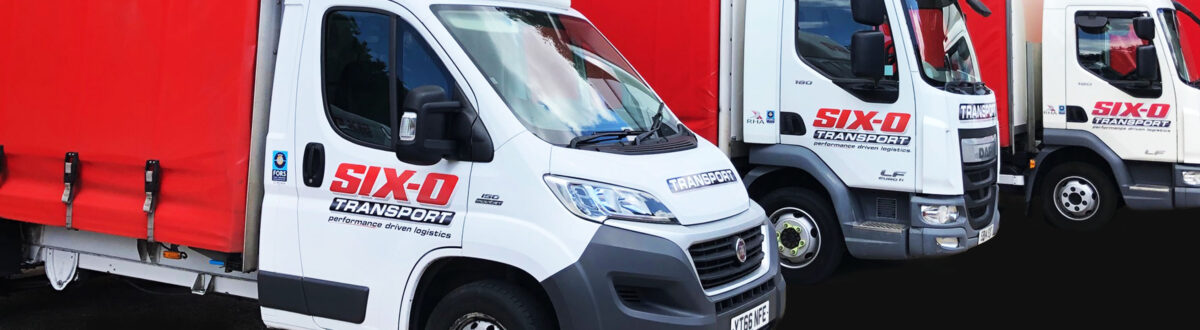 Three of our curtainside lorries lined up in the yard