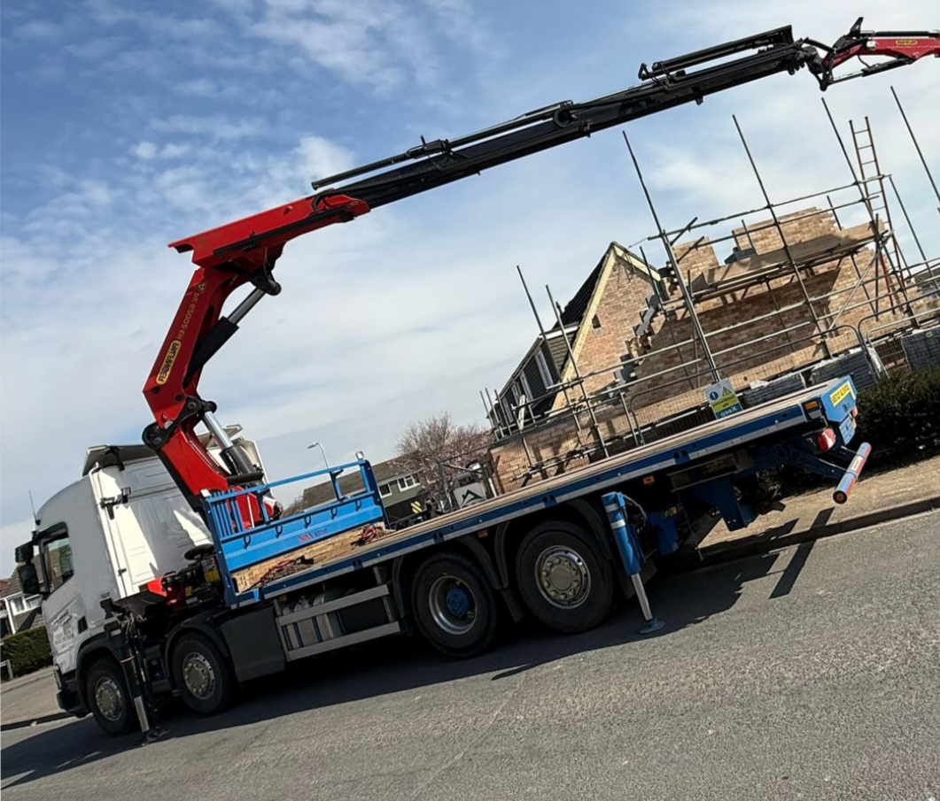 One of our HIAB Crane Lorries with its crane extended up