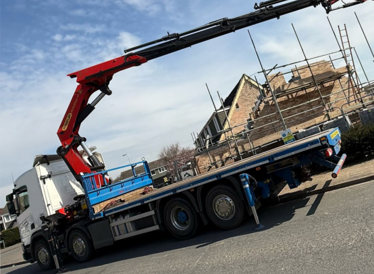One of our HIAB Crane Lorries with its crane extended up